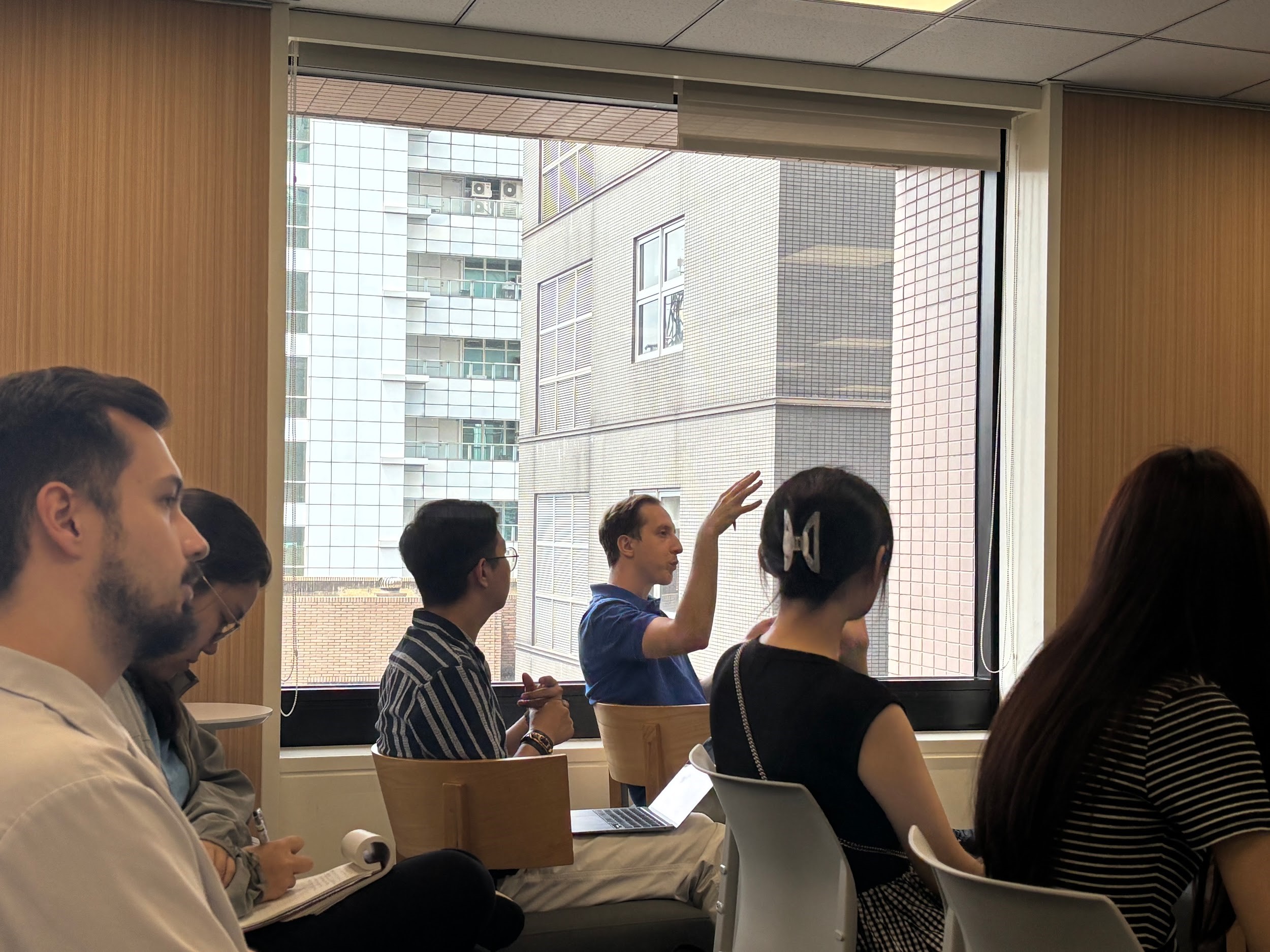 IMAS student Daniel is asking a question during the Q&A session.
